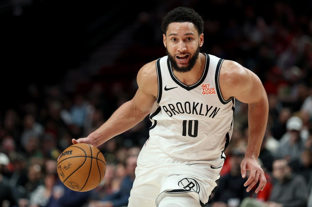 Ben Simmons, who had 11 assists and nine rebounds, dribbles up court during the Nets' win over the Trail Blazers.