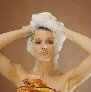 woman shampooing hair