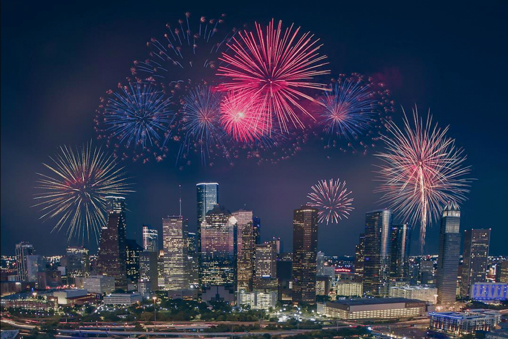 Image shows the beautiful Freedom Over Texas firework display over the Houston skyline.