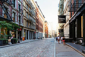 New York City, USA - June 25, 2018: Greene Street with luxury fashion retail stores in Soho Cast Iron historic District in New York City.