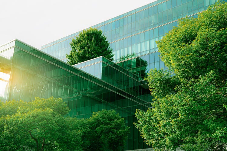 a building with trees in front of it
