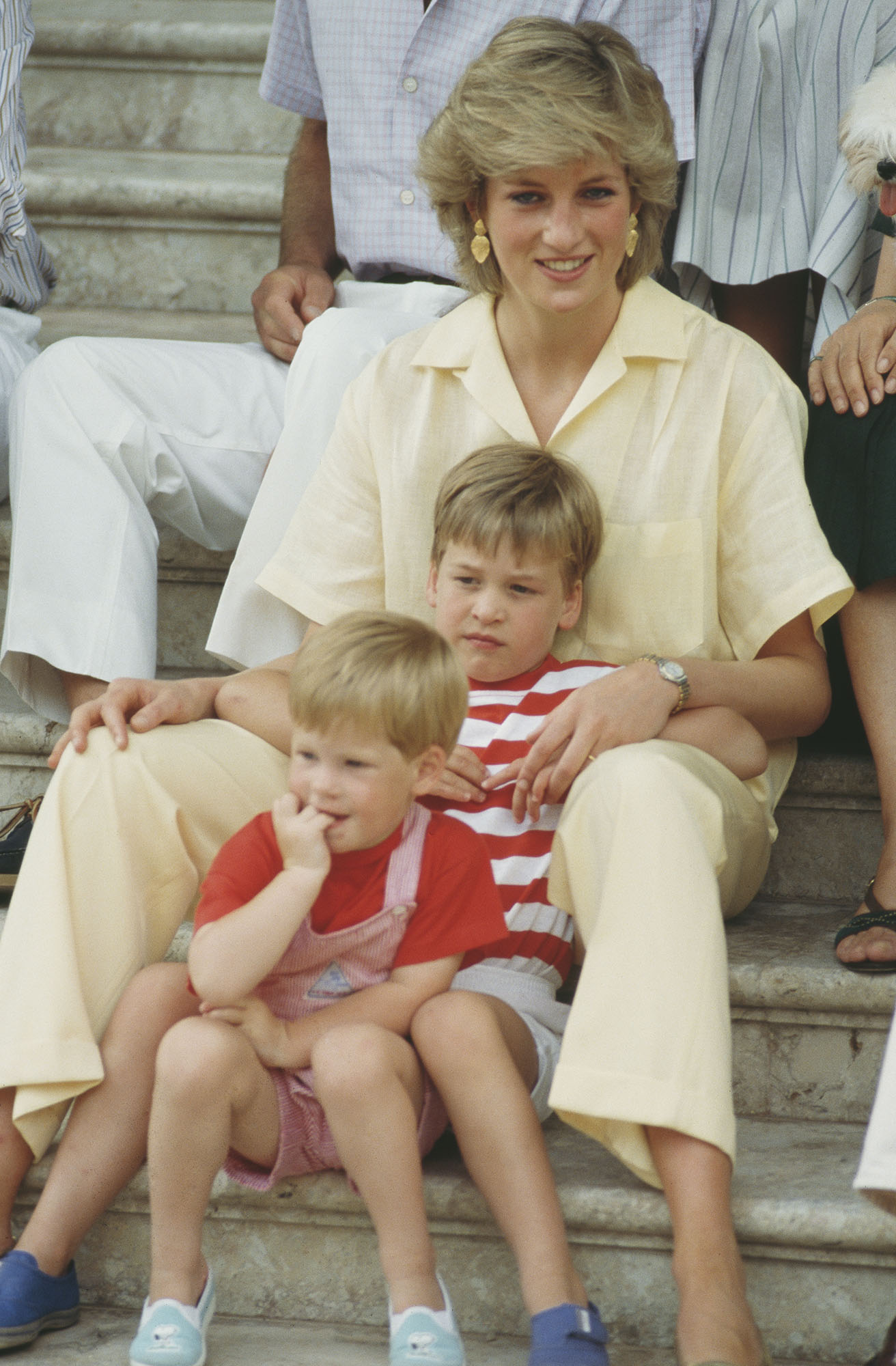 Princess Diana with her sons William and Harry during a holiday with the Spanish royal family at the Marivent Palace in Palma de Mallorca, Spain in August 1987. 