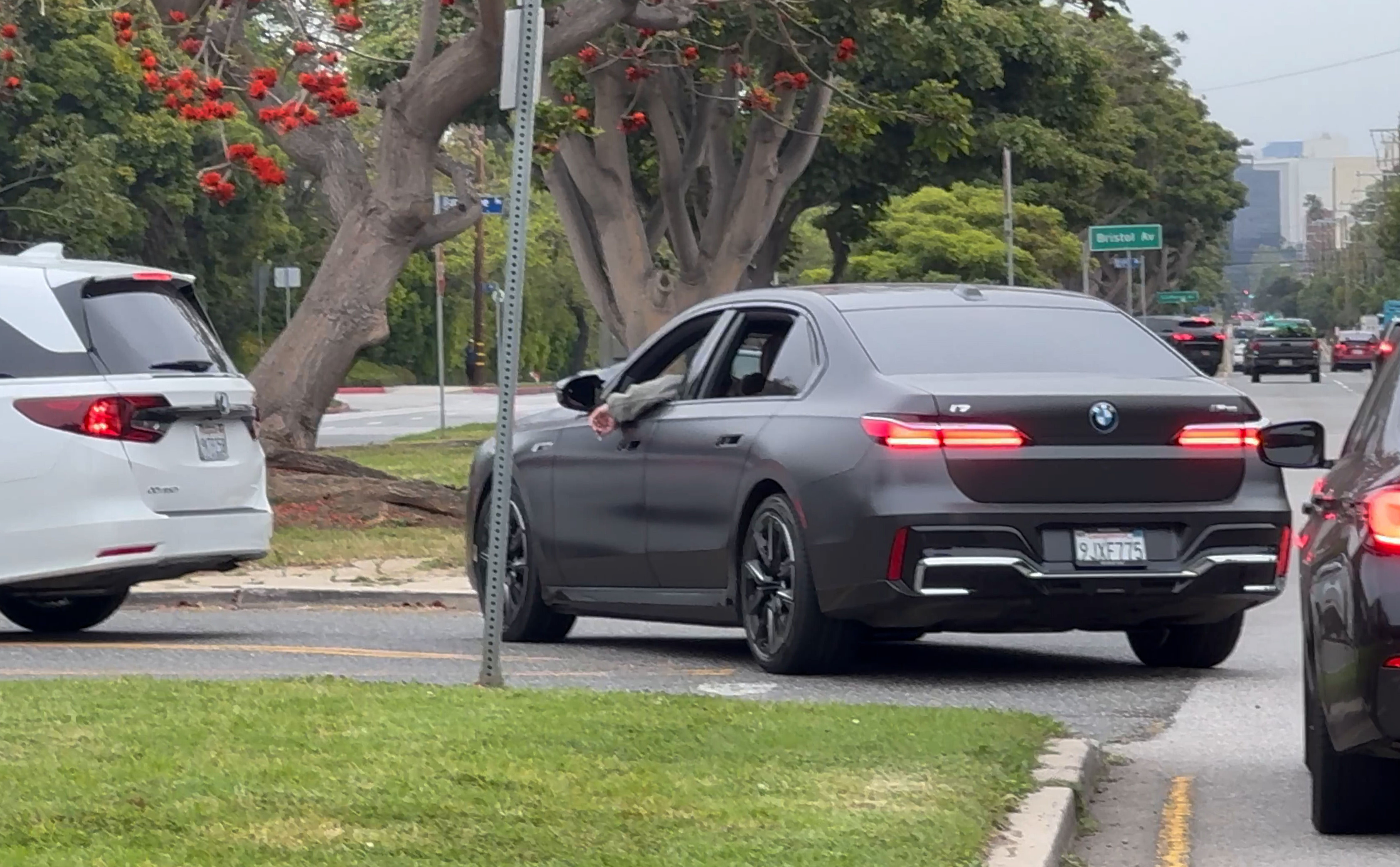 Ben Affleck driving in his car.