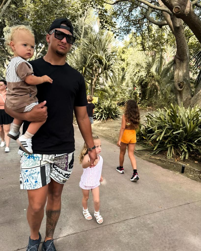 Patrick Mahomes with Sterling and Bronze at the zoo. 