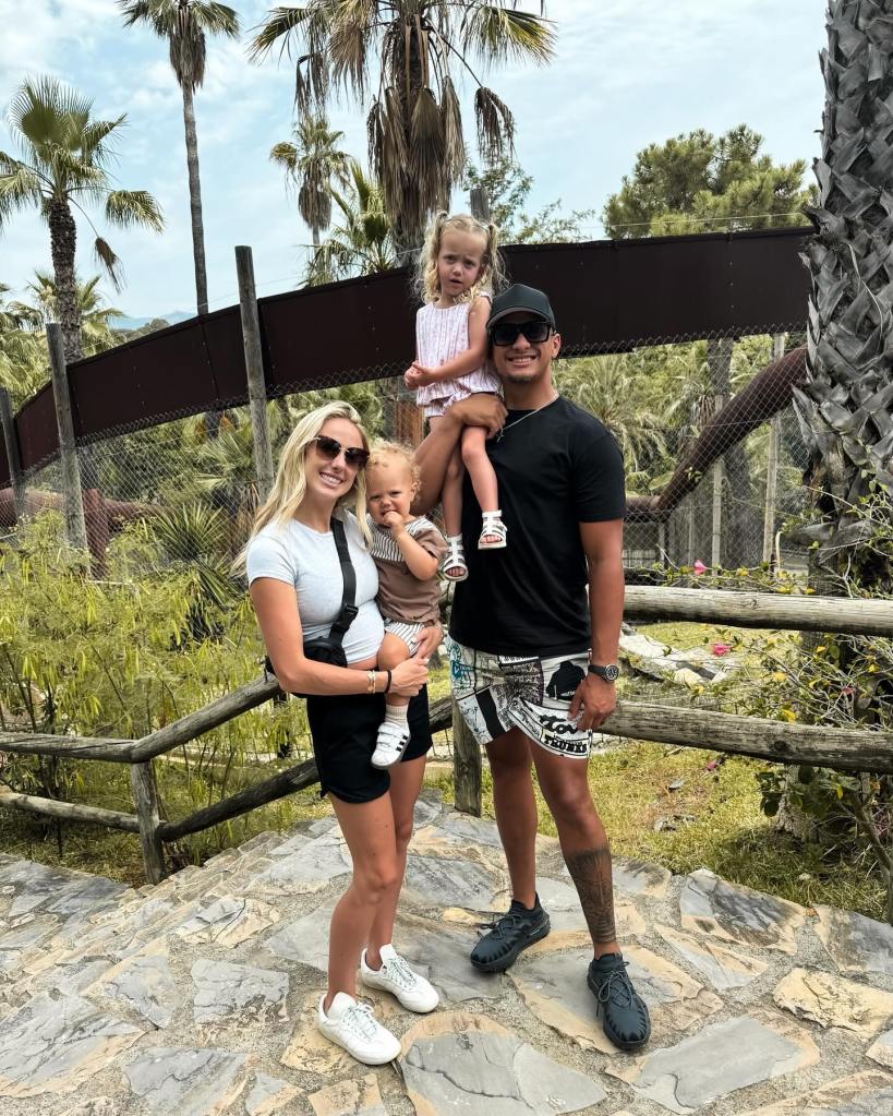 Brittany and Patrick Mahomes in Spain with Sterling and Bronze. 