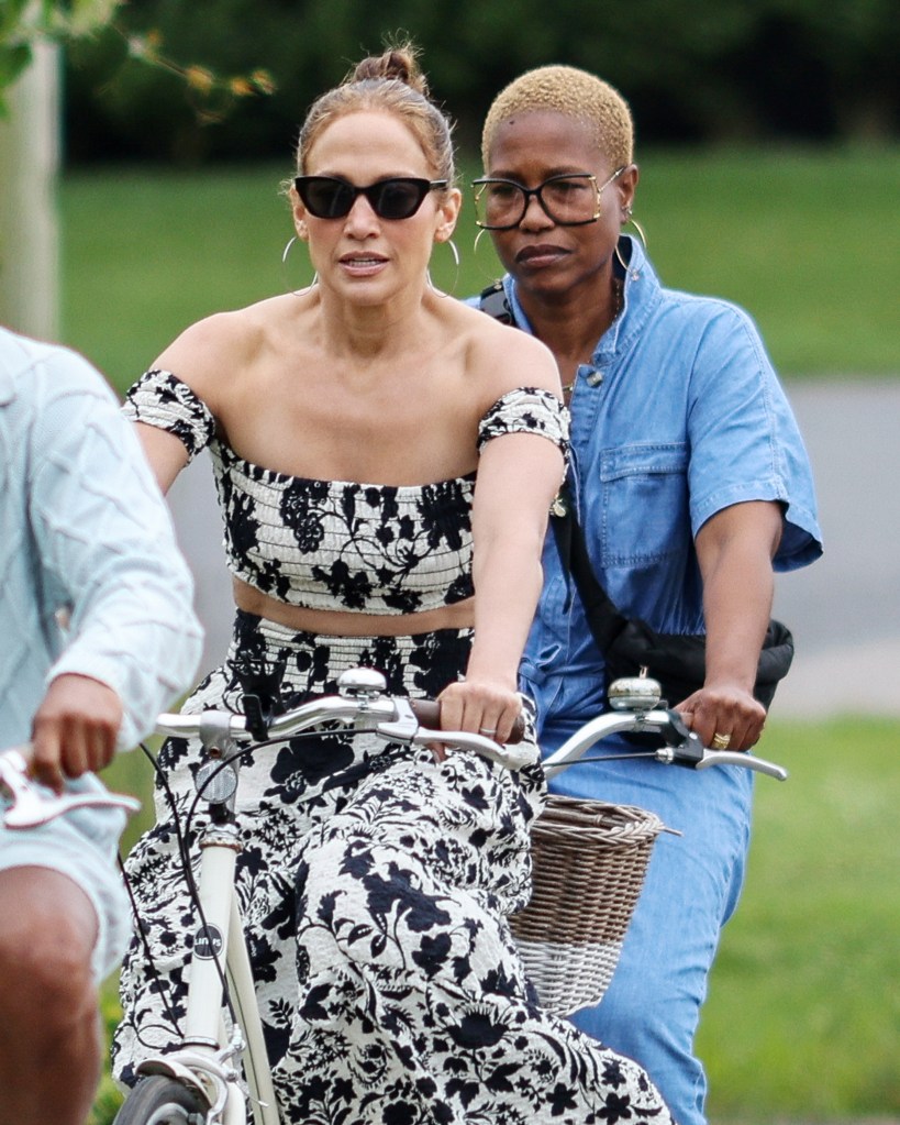 Jennifer Lopez in a Misa floral skirt set while biking in the Hamptons. 