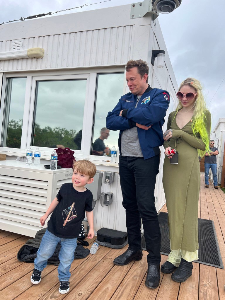 Musk and Grimes stand outside with son in Aug. 2023 Instagram post.