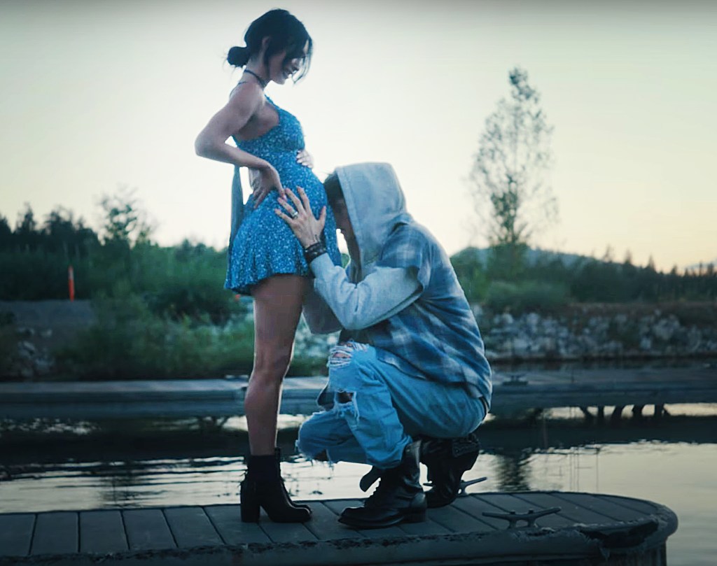 MGK kissed Fox's bump in the "Lonely Roads" video, released Friday.