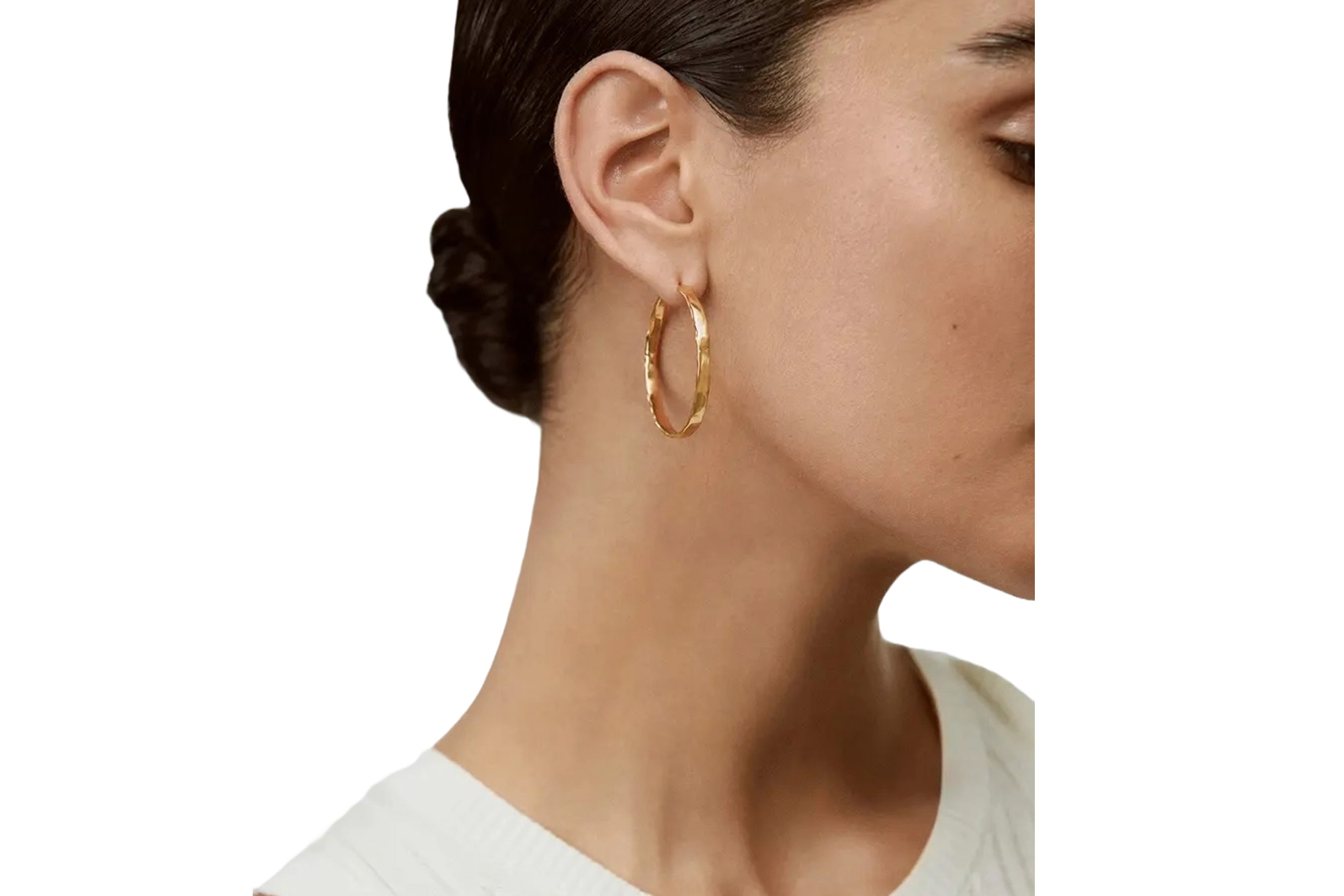 A model in hoop earrings