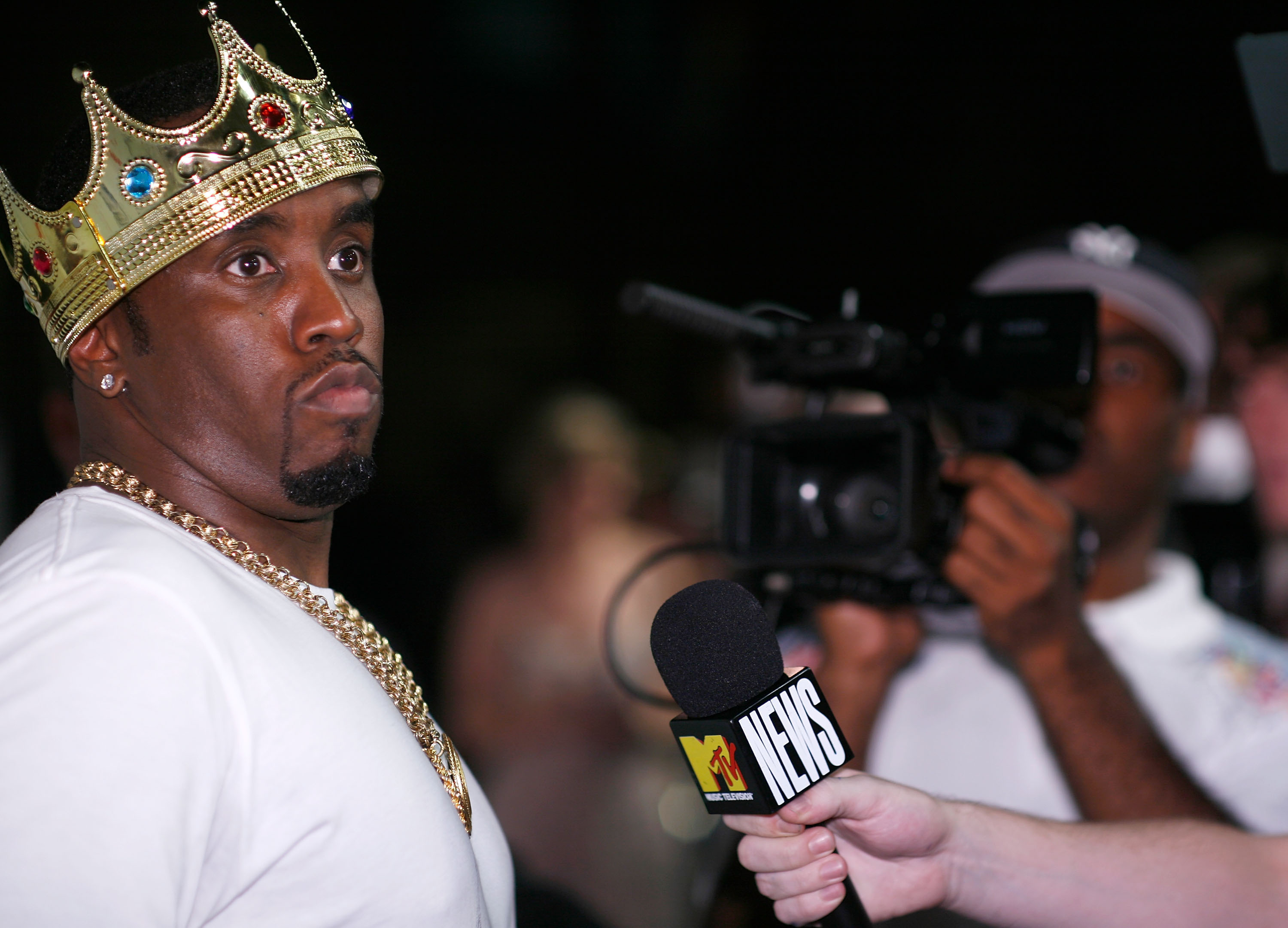 Sean Combs wearing a crown.