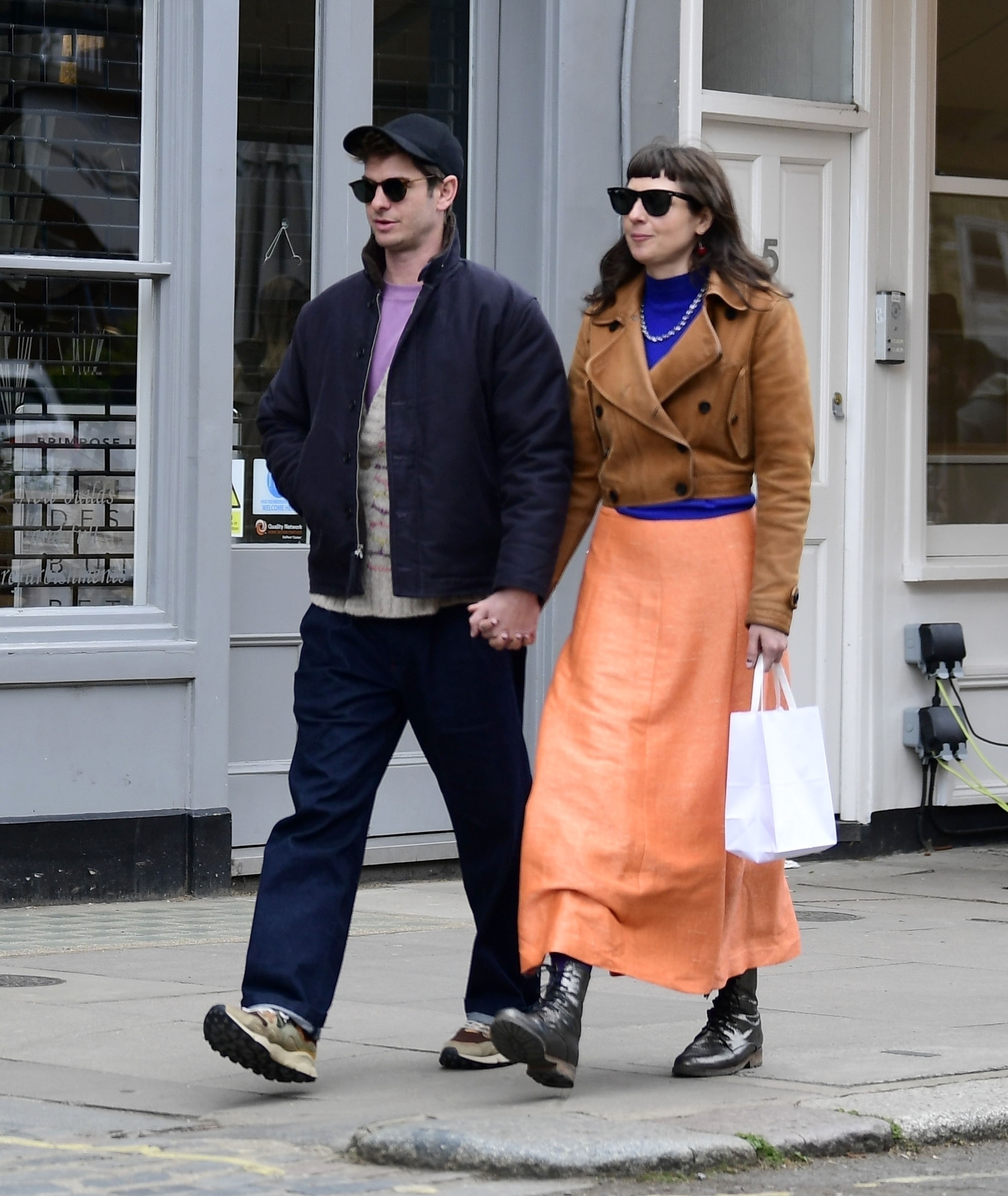 Spiderman Actor Andrew Garfield and New Flame Dr. Kate Tomas are all smiles while pictured hand in hand while enjoying the sights in Primrose Hill in April 2024.