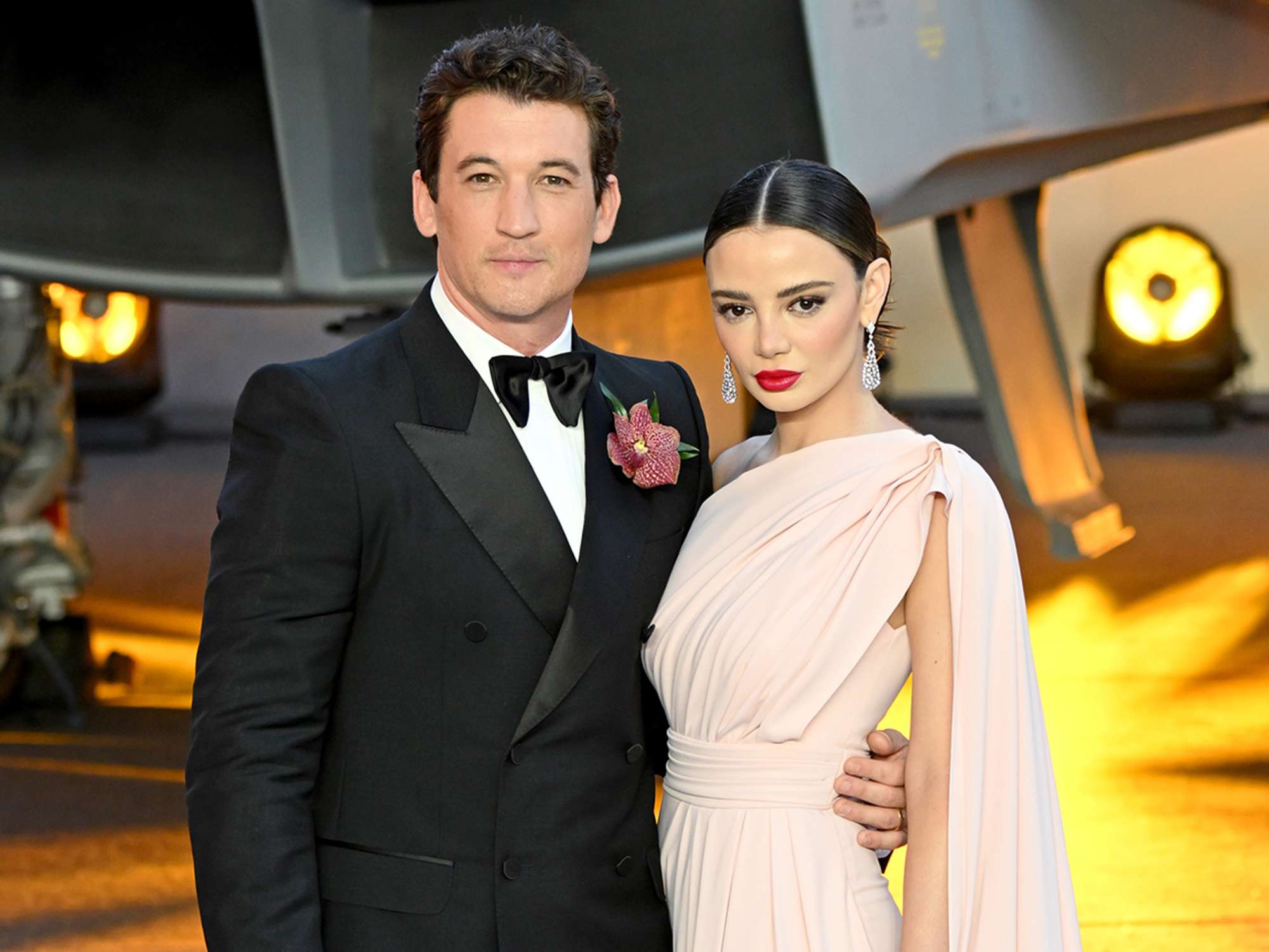 Miles Teller and Keleigh Sperry attend the UK Premiere and Royal Film Performance of "Top Gun: Maverick" at Leicester Square on May 19, 2022 in London, England