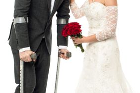 Bride with man on crutches