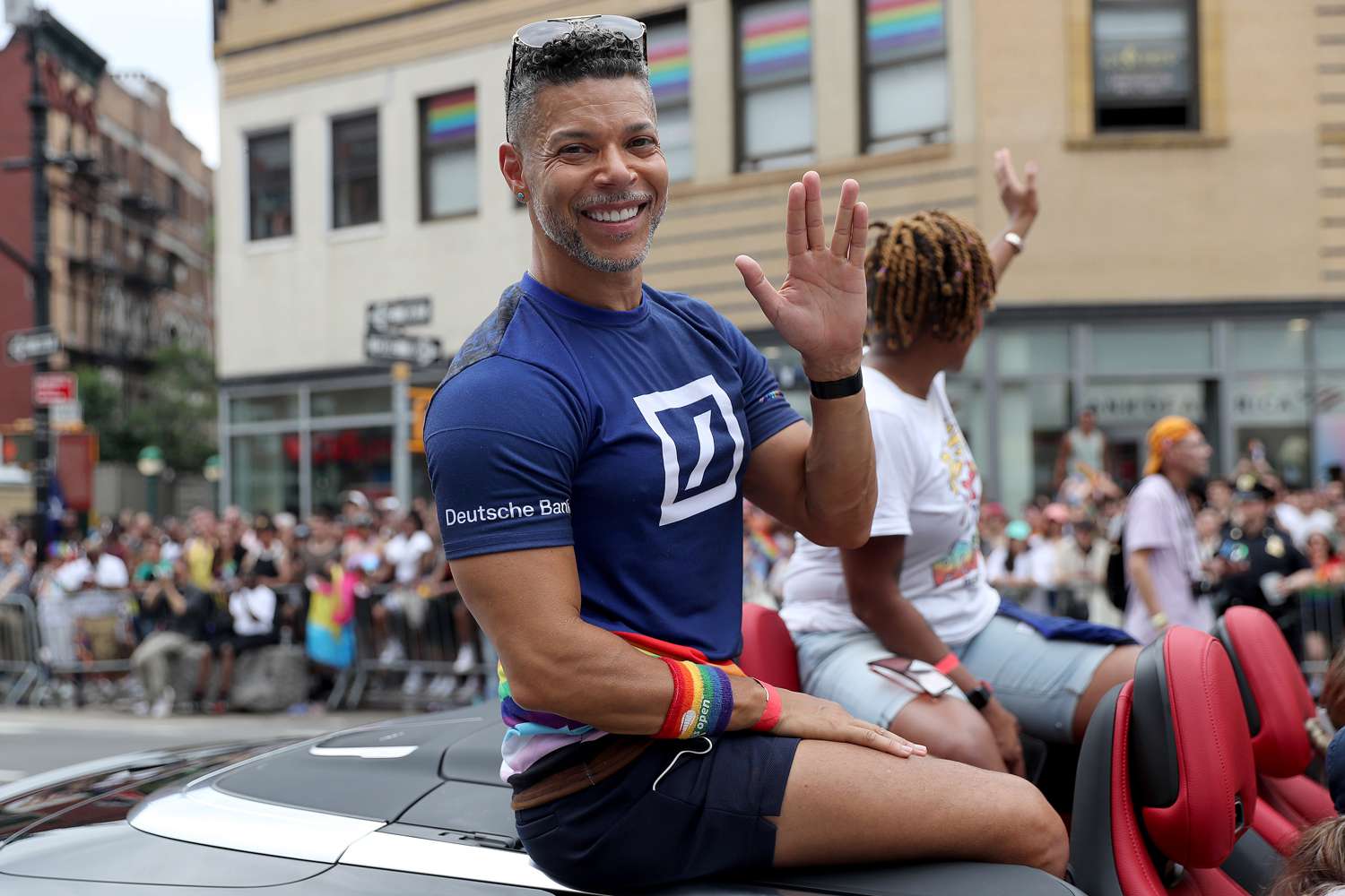 Wilson Cruz flashes paradegoers the Vulcan peace hand gesture during the annual New York City Pride March. Cruz, 