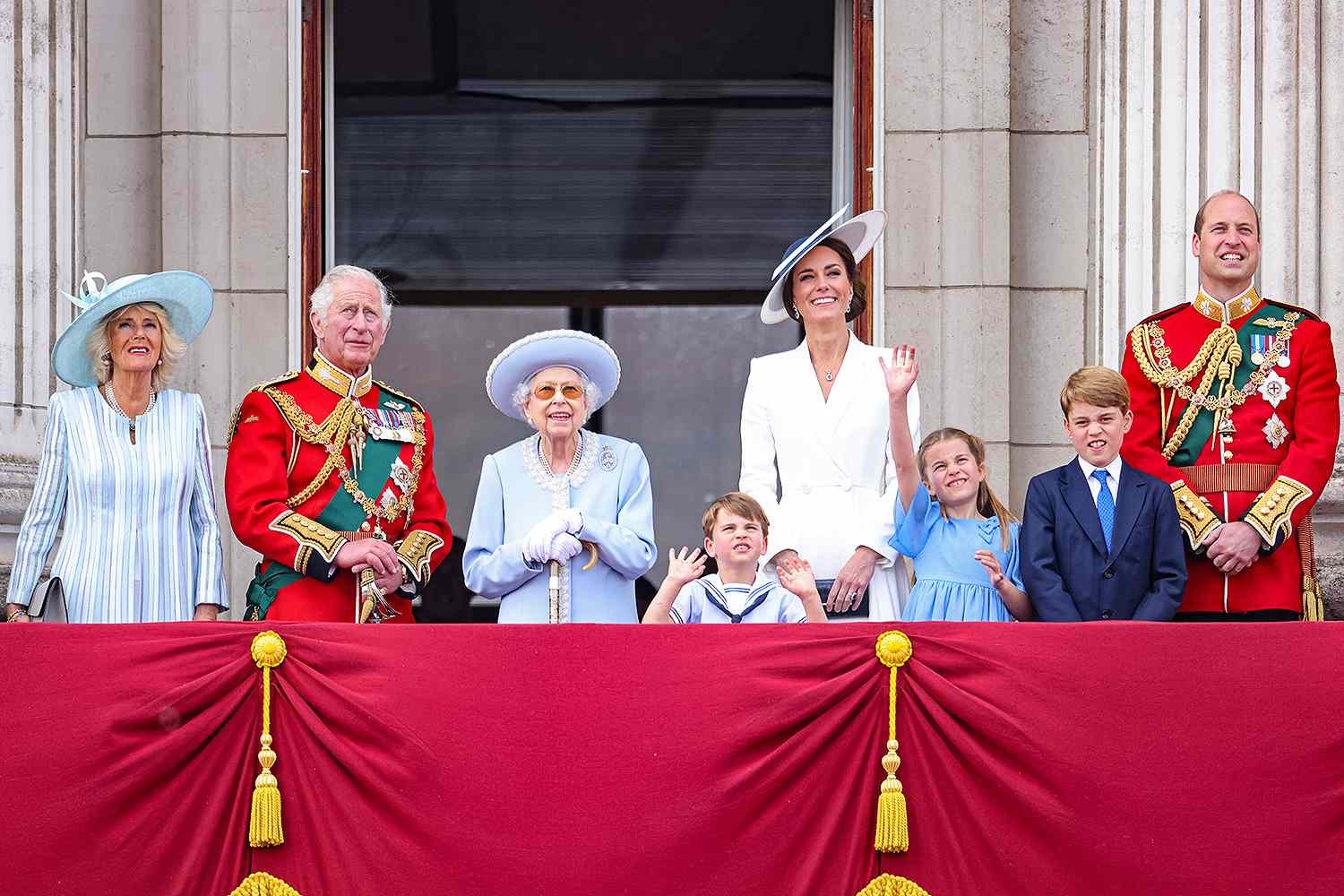 Camilla, Duchess of Cornwall, Prince Charles, Prince of Wales, Queen Elizabeth II, Prince Louis of Cambridge, Catherine, Duchess of Cambridge, Princess Charlotte of Cambridge, Prince George of Cambridge and Prince William, Duke of Cambridge on the balcony of Buckingham Palace watch the RAF flypast 