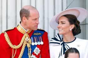 Prince William, Prince of Wales (Colonel of the Welsh Guards) and Catherine, Princess of Wales watch an RAF flypast from the balcony of Buckingham Palace after attending Trooping the Colour on June 15, 2024 in London, England