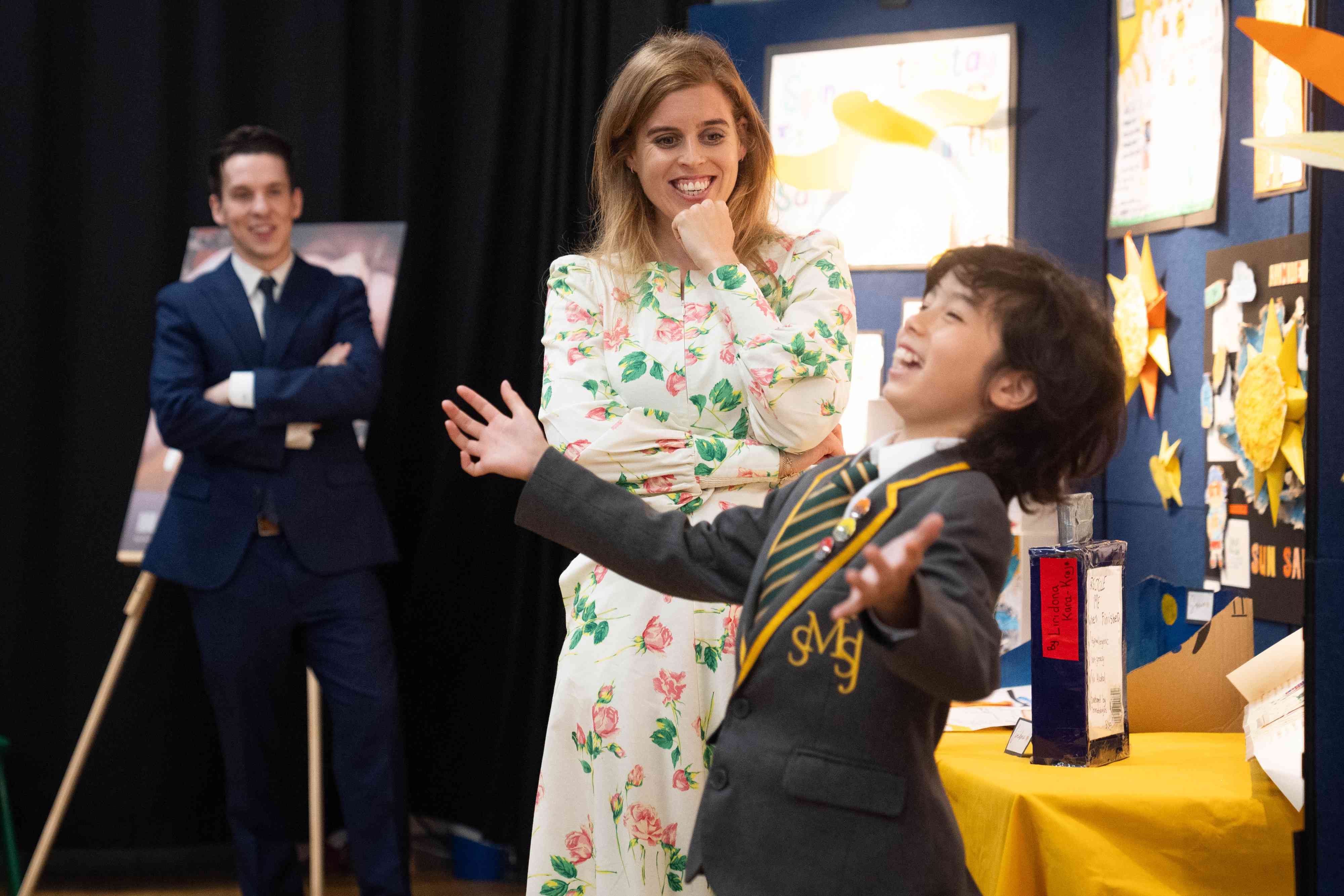 Princess Beatrice, patron of the British Skin Foundation, reacts as a child informs his class of dangers of not wearing sun cream, as she meets Year 5 pupils who have created sun safety posters to highlight the importance of protecting your skin from potential skin cancers in later life, during a visit to St Mary's and St John's primary school in north west London