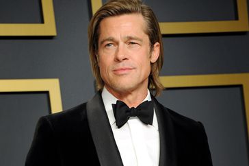 Brad Pitt poses with his Oscar in the press room during the 92nd Annual Academy Awards at Hollywood and Highland on February 09, 2020 in Hollywood, California
