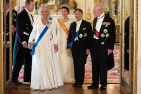 King Charles III, Britain's Queen Camilla, Japan's Emperor Naruhito and Japan's Empress Masako arrive to pose for a formal photograph ahead of a State Banquet at Buckingham Palace in London on June 25, 2024, 