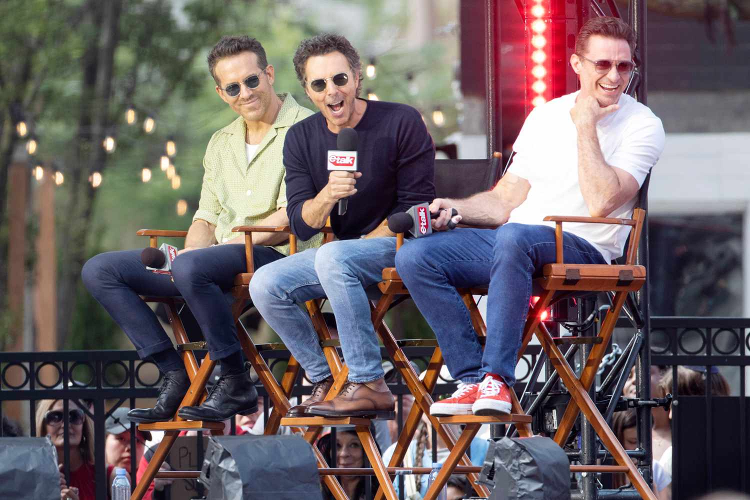 Ryan Reynolds, Hugh Jackman and Shawn Levy Attend an Outdoor Interview with eTalk in Toronto.