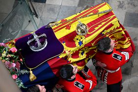 The coffin of Queen Elizabeth II with the Imperial State Crown resting on top is carried by the Bearer Party into Westminster Abbey during the State Funeral of Queen Elizabeth II on September 19, 2022 in London, England. Elizabeth Alexandra Mary Windsor was born in Bruton Street, Mayfair, London on 21 April 1926. She married Prince Philip in 1947 and ascended the throne of the United Kingdom and Commonwealth on 6 February 1952 after the death of her Father, King George VI. Queen Elizabeth II died at Balmoral Castle in Scotland on September 8, 2022, and is succeeded by her eldest son, King Charles III.