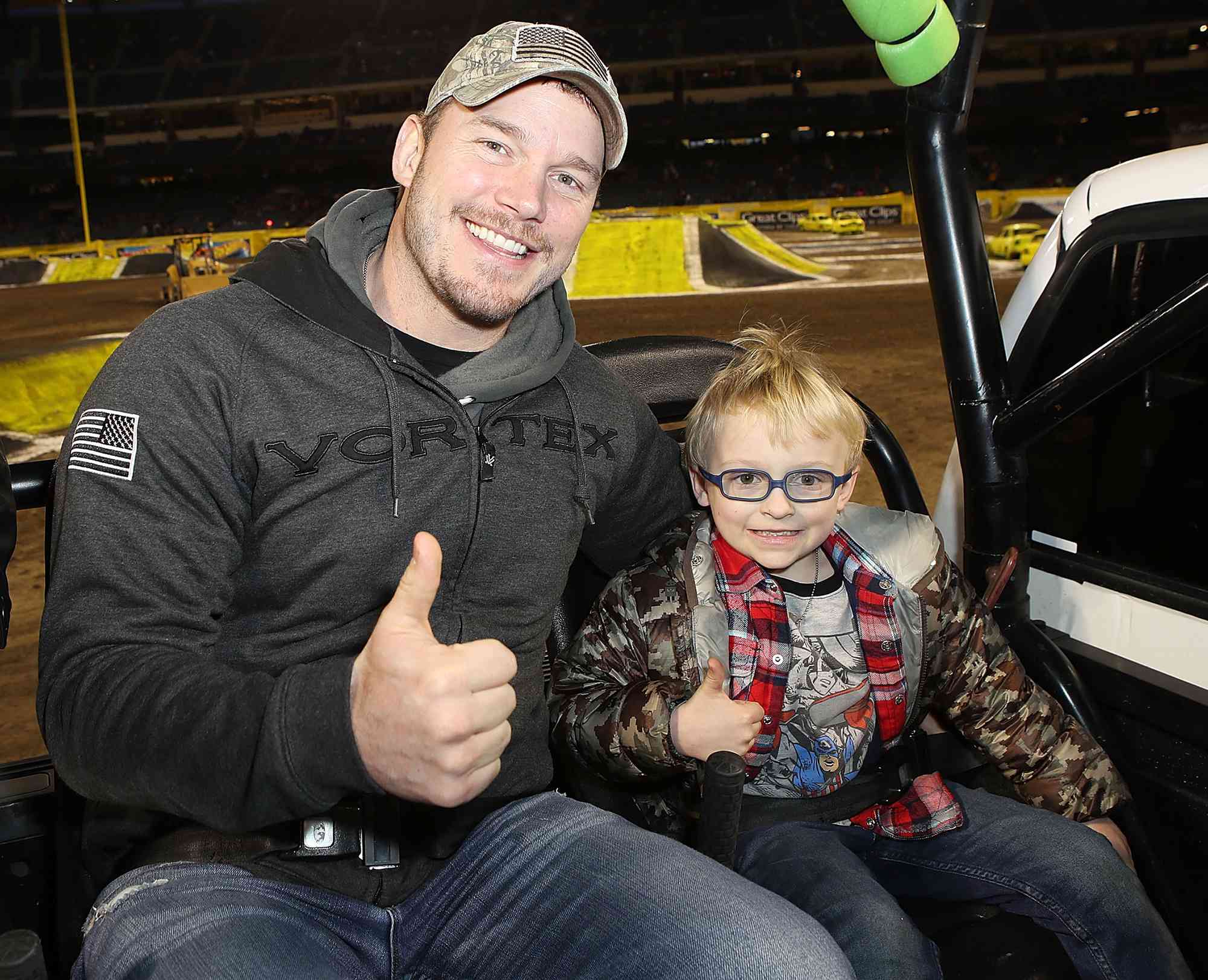 Chris Pratt and son Jack attend Monster Jam Celebrity Event at Angel Stadium on February 24, 2018 in Anaheim, California