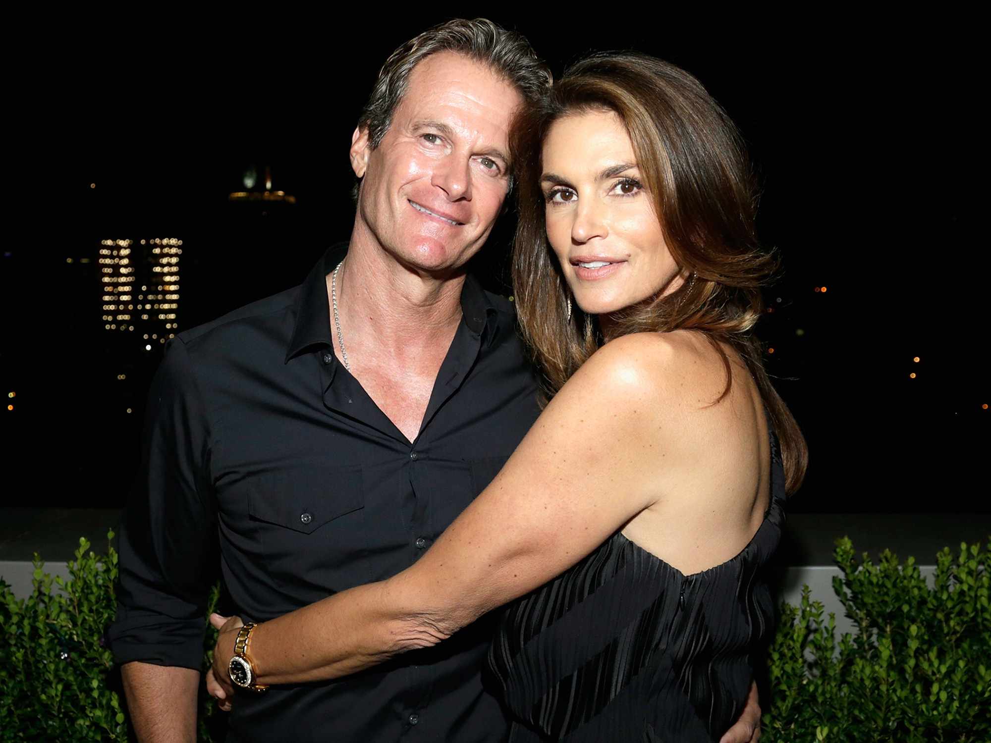 Rande Gerber and model Cindy Crawford attends the fashion week celebration with DuJour Magazine