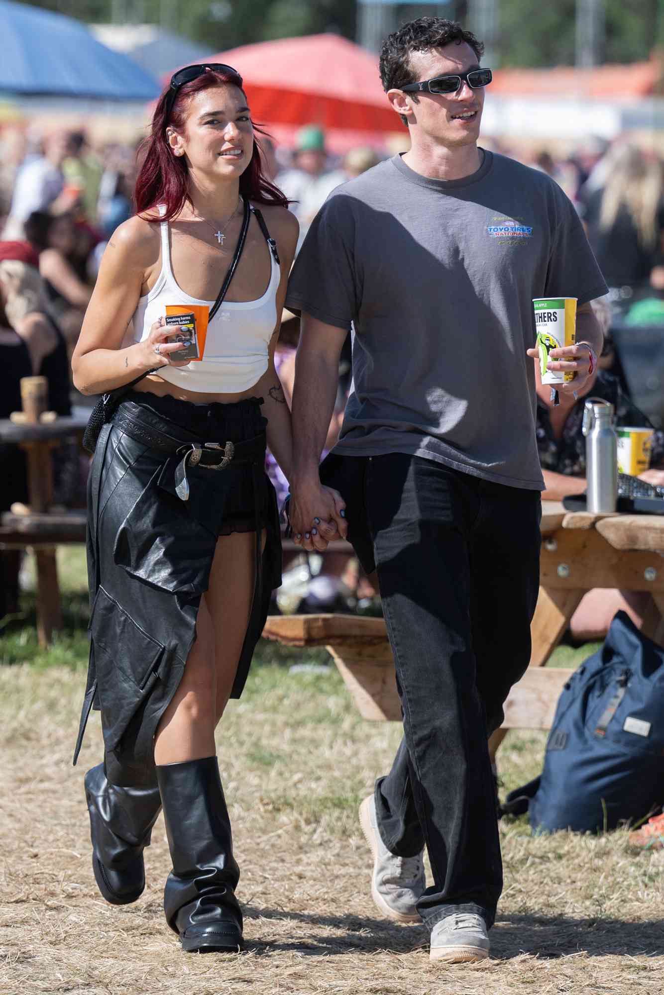 Dua Lipa and Callum Turner during day four of Glastonbury Festival 2024 at Worthy Farm, Pilton on June 29, 2024 in Glastonbury, England. 