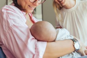 mother and baby with guest in hospital