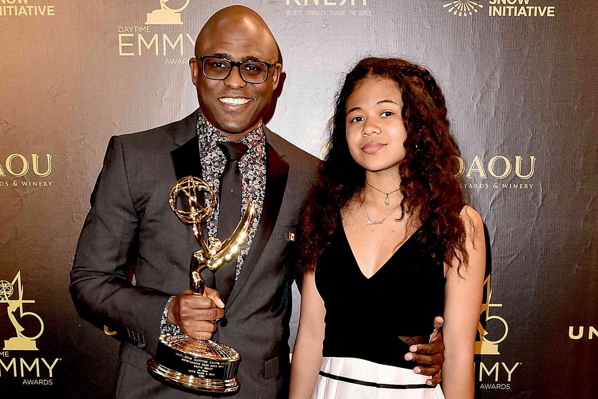 Wayne Brady and Maile Masako Brady attend the 2018 Daytime Emmy Awards on April 29, 2018 in Pasadena, California. 