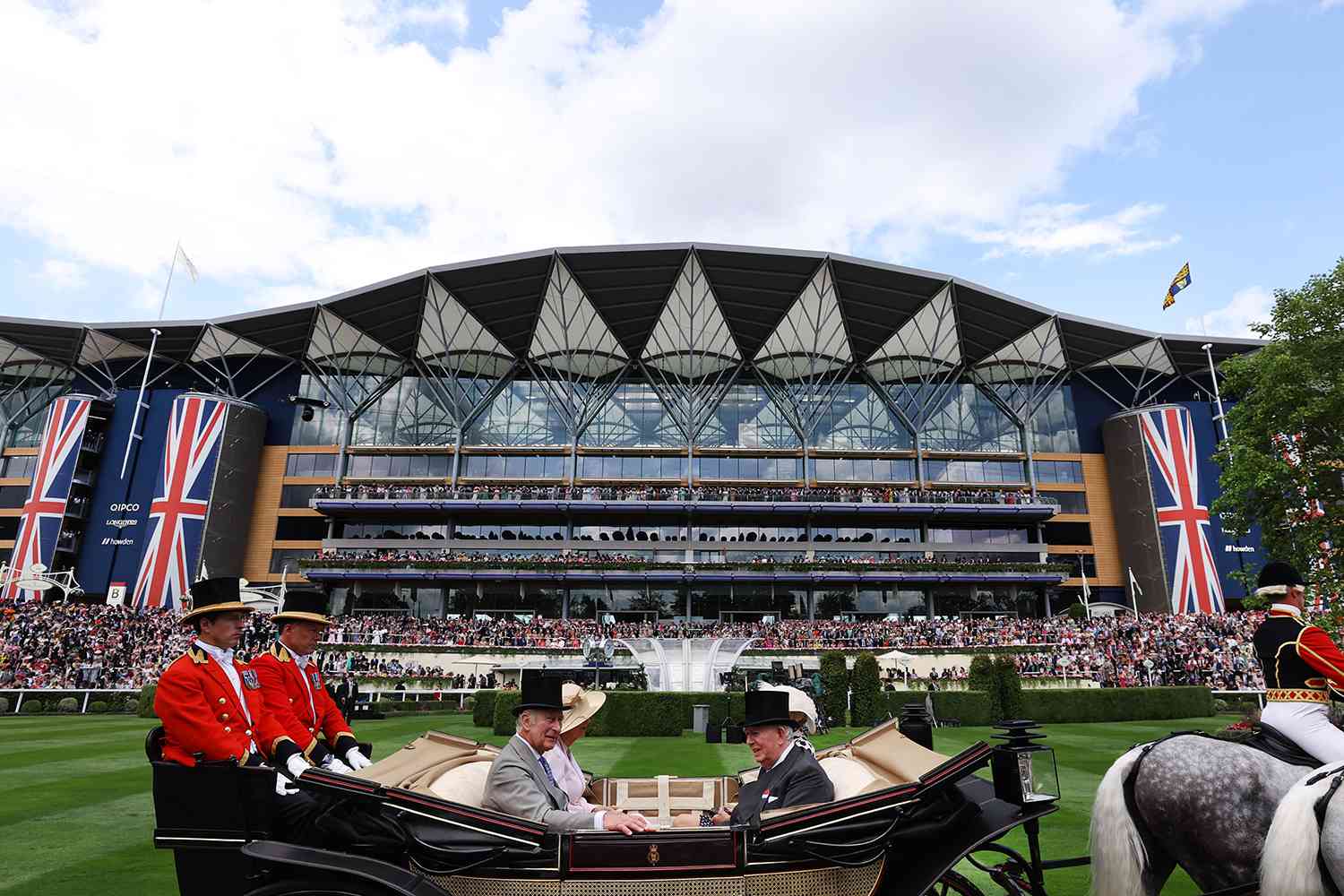 King Charles III arrives with Queen Camilla in The Royal Procession during day two of Royal Ascot 2023