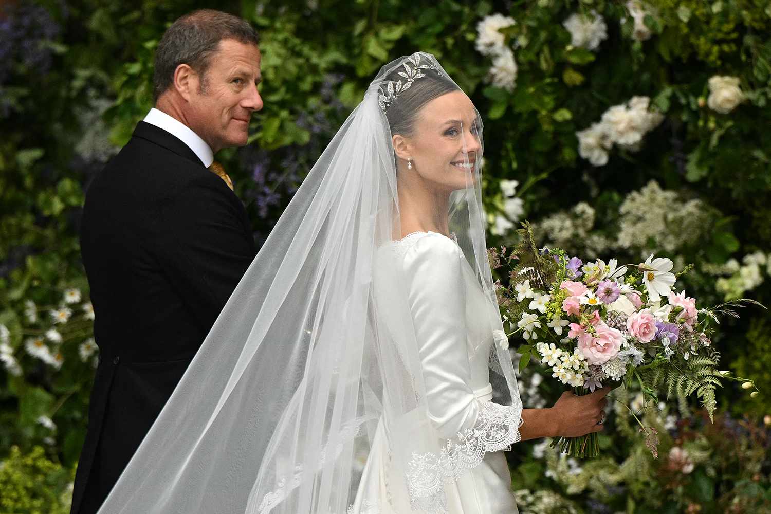 Bride Olivia Henson arrives to attend her wedding to the Duke of Westminster, at Chester Cathedral in Chester