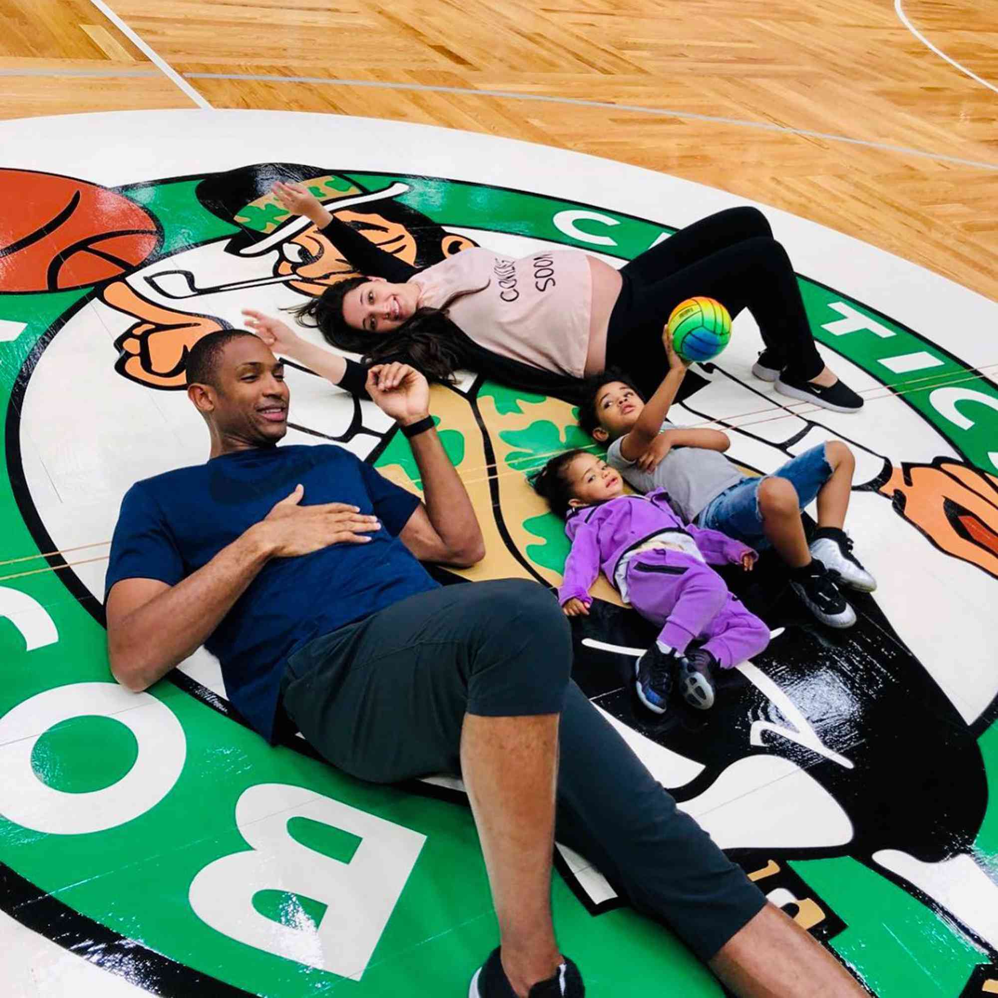 Al Horford and Amelia Vega with their kids.