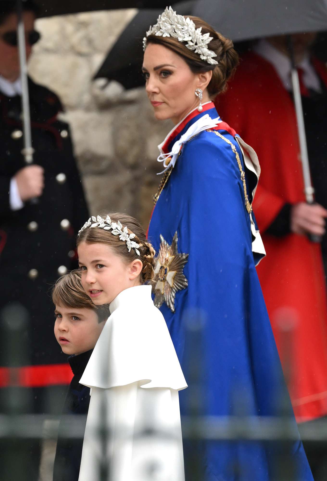 Catherine, Princess of Wales, Prince Louis and Princess Charlotte arrive at Westminster Abbey for the Coronation of King Charles III