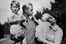 Undated picture showing the Royal British couple, Queen Elizabeth II, and her husband Philip, Duke of Edinburgh, with their two children, Charles, Prince of Wales (L) and Princess Anne (R), circa 1951