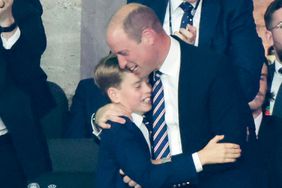 Prince George of Wales and Prince William, Prince of Wales celebrate the goal for England during the UEFA EURO 2024 final match between Spain and England at Olympiastadion on July 14, 2024 in Berlin, Germany.