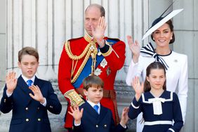 Prince George of Wales, Prince William, Prince of Wales (Colonel of the Welsh Guards), Prince Louis of Wales, Princess Charlotte of Wales and Catherine, Princess of Wales watch an RAF flypast from the balcony of Buckingham Palace 