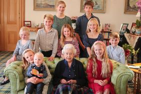 Elizabeth II poses with some of her grandchildren and great grandchildren (back row, left to right) Lady Louise Mountbatten-Windsor and James, Earl of Wessex, (middle row, left to right) Lena Tindall, Prince George, Princess Charlotte, Isla Phillips, Prince Louis, and (front row, left to right) Mia Tindall holding Lucas Tindall, and Savannah Phillips at Balmoral Castle in 2022 in Aberdeen, Scotland
