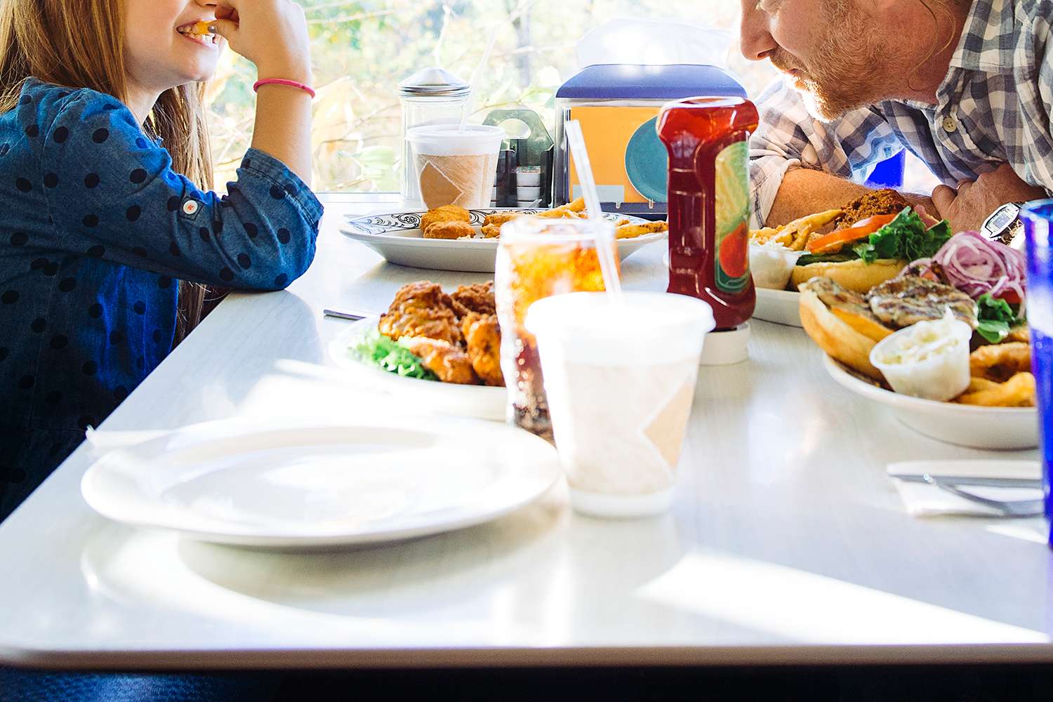 Dad takes daughter out to eat