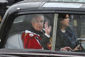 Prince Andrew, Duke of York and Princess Eugenie of York travelling in a state car during the Coronation of King Charles III and Queen Camilla