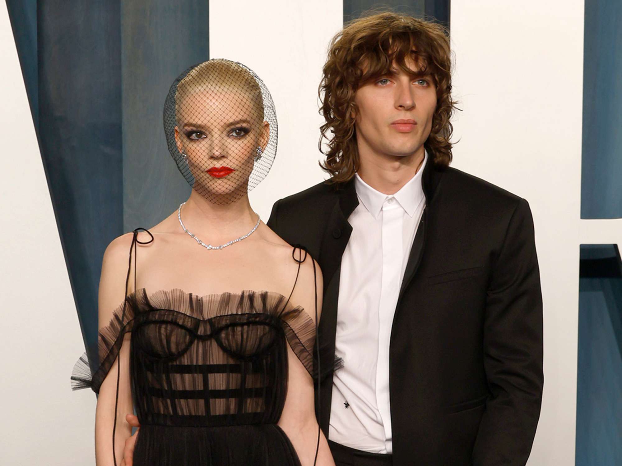 Anya Taylor-Joy and Malcolm McRae attend the 2022 Vanity Fair Oscar Party hosted by Radhika Jones at Wallis Annenberg Center for the Performing Arts on March 27, 2022 in Beverly Hills, California