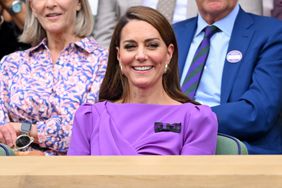 Catherine Princess of Wales laughing court-side of Centre Court during the men's final on day fourteen of the Wimbledon Tennis Championships at the All England Lawn Tennis and Croquet Club on July 14, 2024 in London, England. 