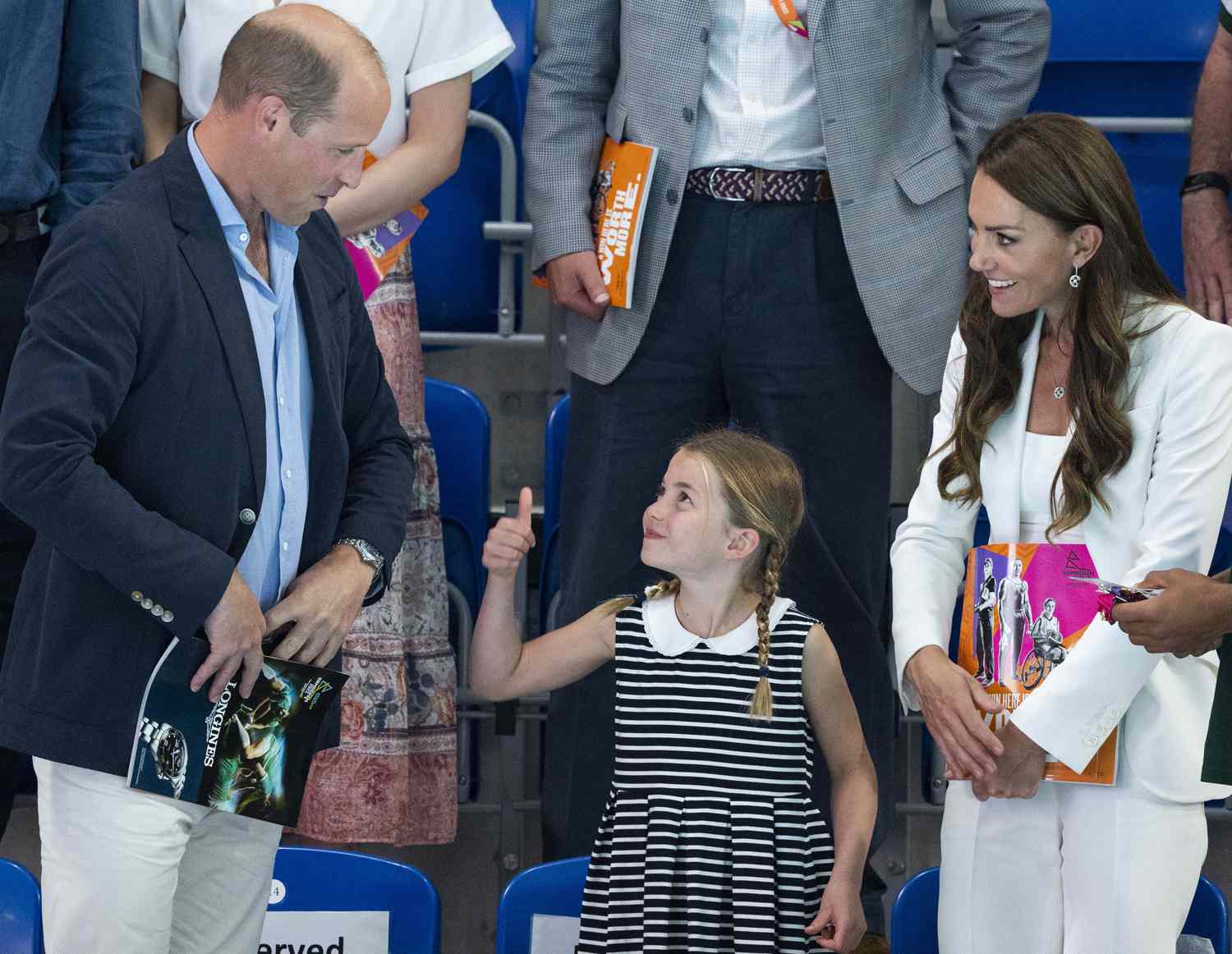 Prince William, Duke of Cambridge and Catherine, Duchess of Cambridge with Princess Charlotte of Cambridge at the swimming during the 2022 Commonwealth Games