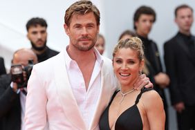 Chris Hemsworth and Elsa Pataky attend the "Furiosa: A Mad Max Saga" (Furiosa: Une Saga Mad Max) Red Carpet at the 77th annual Cannes Film Festival at Palais des Festivals on May 15, 2024 in Cannes, France. 