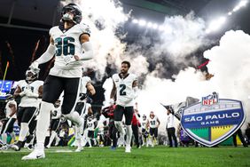 Tristin McCollum #36 of the Philadelphia Eagles and cornerback Darius Slay Jr. #2 enter the field during player introductions prior to an NFL football game against the Green Bay Packers, at Arena Corinthians on September 6, 2024