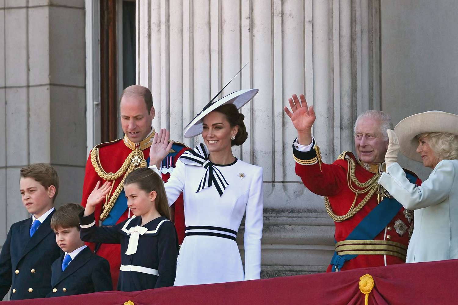 Prince George of Wales, Britain's Prince Louis of Wales, Britain's Prince William, Prince of Wales, Britain's Princess Charlotte of Wales, Britain's Catherine, Princess of Wales, Britain's King Charles III and Britain's Queen Camilla wave from the balcony of Buckingham Palace after attending the King's Birthday Parade, "Trooping the Colour"