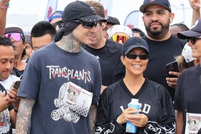  Kourtney Kardashian and Travis Barker participate in the Run Travis Run 5K marathon, showing their support for the event.