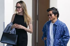 Angelina Jolie, Pax Thien Jolie-Pitt, enjoy a sushi dinner at Sushi Park in West Hollywood, with Pax paying the valet using his AMEX Business card as he smoothly grabs it from his jacket pocket and charges it to his business funds.