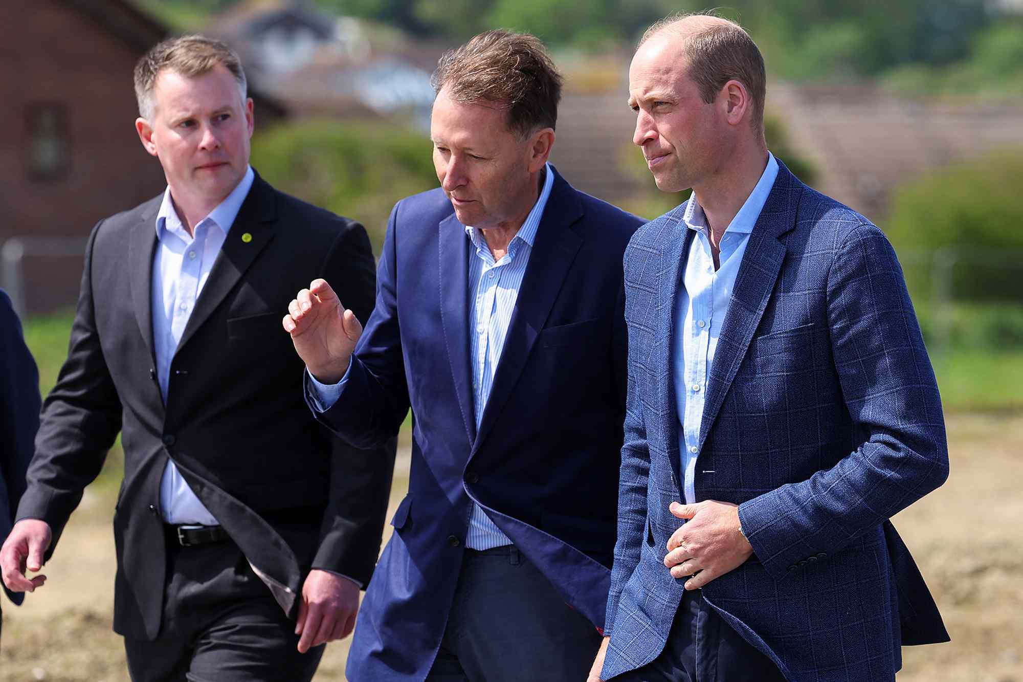 Prince William, the Duke of Cornwall walks with Alastair Martin Secretary of Duchy of Cornwall, during a visit to the site where the Duchy of Cornwall's first ever housing project will be built, in Nansledan, on May 9, 2024 in Newquay, Cornwall, England