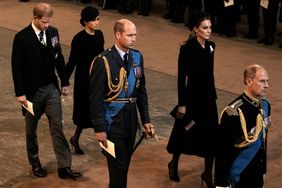 Prince Harry, left, and Meghan, second left, Duchess of Sussex, Prince William, second right, and Kate, Princess of Wales leave Westminster Hall in London